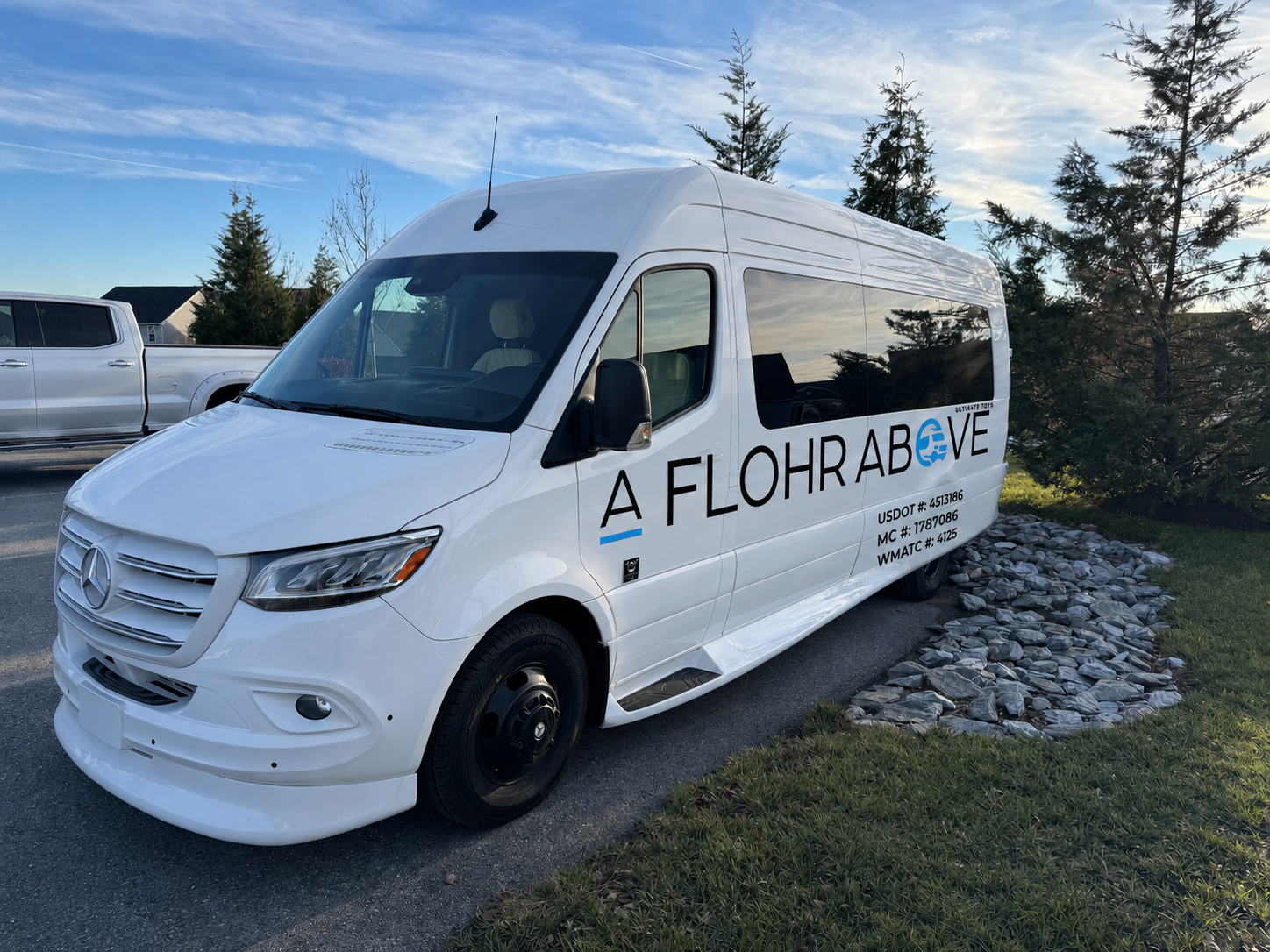 An angled side-view of the A Flohr Above luxury van